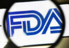 FDA’s Loudest Alarm Hits Popular Snack Food FDA logo under magnifying glass