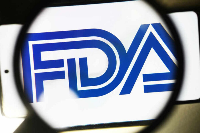 shutterstock_2274913075 FDA logo under magnifying glass