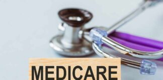 Wooden block with MEDICARE text next to a stethoscope