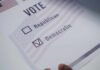 Voters Hate Both — But Pick Democrats? Voting ballot with options for Republican and Democratic parties
