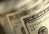 Billionaire Bet Supercharges Kids’ Stock Accounts Close-up of a stack of hundred dollar bills