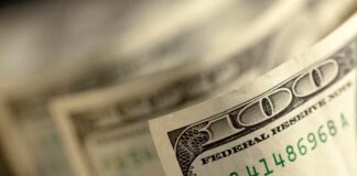 Close-up of a stack of hundred dollar bills