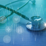 Five Cups Daily — Heart Risk Drops? A stethoscope on a wooden surface with digital health icons and a heartbeat graph overlay