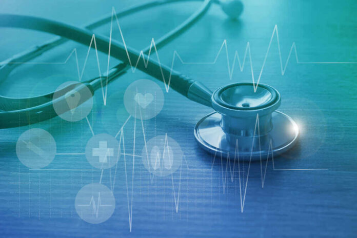 Healthcare,And,Medical,Insurance,Planning,For,Health,Coverage,Concept A stethoscope on a wooden surface with digital health icons and a heartbeat graph overlay
