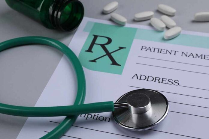 Medical,Prescription,Form,,Stethoscope,And,Pills,On,Light,Grey,Background, A prescription pad with a stethoscope and pills nearby