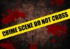School Horror: Deadly Sword Attack Stuns Country Yellow caution tape reading 'CRIME SCENE DO NOT CROSS' over a dark, blood-splattered background