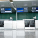 Sticker Shock Coming To Airfares? Empty airport check-in counters G11 to G14.