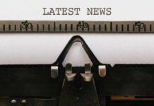 Protein Bomb Drops September 1 Close-up of a typewriter with a sheet of paper displaying the words 'LATEST NEWS'