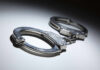 Congresswoman’s Son Arrest Spurs Explosive Case Close-up of metallic handcuffs on a light surface
