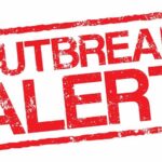 Outbreak alert stamp in red with distressed texture