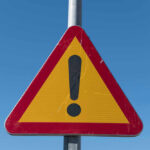 Steering FAILURE: 208,724 SUVs Recalled Triangular warning sign with exclamation mark.