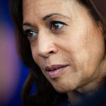 Kamala Jumps Back Into Politics WHERE? Kamala Harris with serious expression looking off-camera.