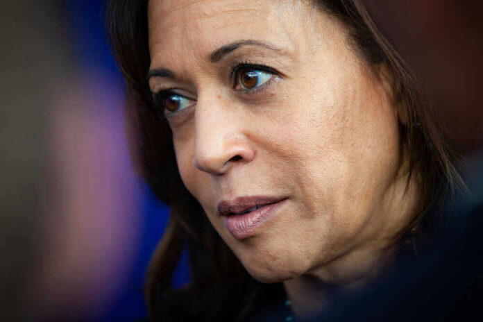 Kamala Harris with serious expression looking off-camera.