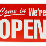 Red Come in, Were Open sign.