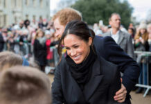 School Run Triggers Emergency Switch By Royals? A woman smiling and interacting with a crowd.