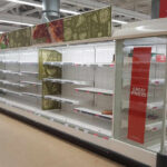 Foreign Labels Spark Multi-State Cookie Recall Empty supermarket shelves with great prices signage