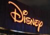 Disney Star Dies at 33 — Fans Stunned Illuminated Disney logo against a dark background