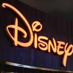 Disney Star Dies at 33 — Fans Stunned Illuminated Disney logo against a dark background