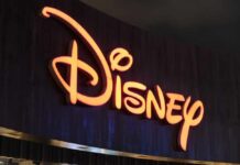Disney Star Dies at 33 — Fans Stunned Illuminated Disney logo against a dark background