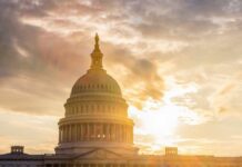 Capitol Showdown Over ‘American Elections’ The Capitol building in Washington D.C. silhouetted against a sunset