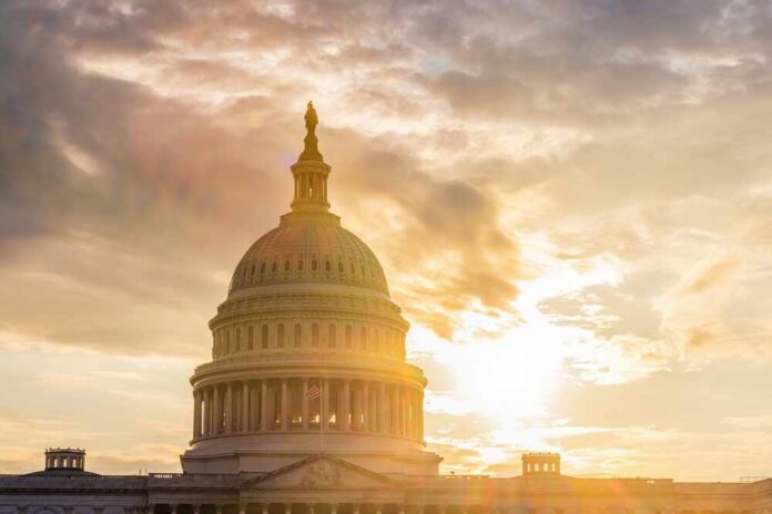 Sunset,Behind,The,Us,Capitol,Building,Dome,In,Washington,Dc. The Capitol building in Washington D.C. silhouetted against a sunset