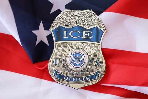 Kyiv,,Ukraine,-,March,9,,2024,Us,Ice,Officer,Badge ICE officer badge placed on an American flag
