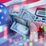 Income Milestone Stuns Economists USA flag calculator and hands holding dollars overlapping