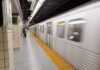 Random Subway Slashing Stuns Onlookers Subway train arriving at an underground platform