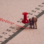 Miniature elderly figures by retire pin marker