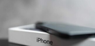 Google and Apple logos on smartphones.