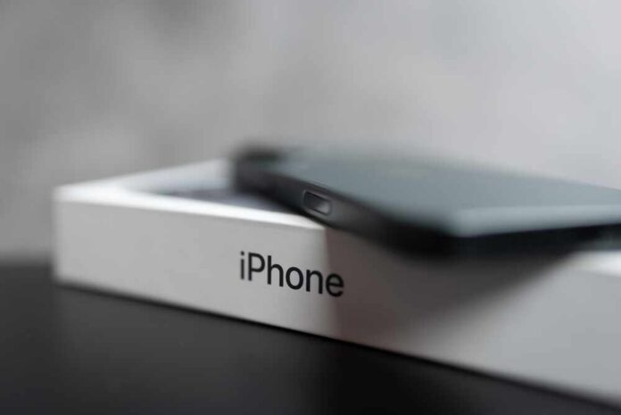 Google and Apple logos on smartphones.