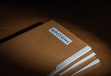 High-Stakes Epstein Vote Triggered Stack of brown file folders with a label reading 'EPSTEIN'