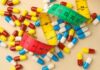 Governor’s 80-Pound Drop Sparks 2028 Buzz Colorful capsules scattered with a measuring tape