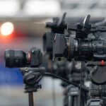 Police Draw Hard Line On Chaos Professional video cameras on tripods