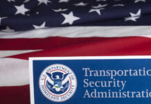 TSA Lets Non-Flyers Do WHAT? Transportation Security Administration sign in front of an American flag