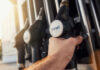 NEW Gas Shock, But Only After 160 Liters? A hand holding a diesel fuel nozzle at a gas station