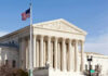 Supreme Court Puts DHS Election Tool Back In Play U.S. Supreme Court building with American flag.