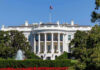 Five-Day White House Fiasco White House with trees and fountain.