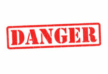 House Of Horrors: DA Drops Bombshell Red danger stamp on white background