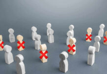 AI Bill Hits – Workers Panic Wooden figures with red X marks, signifying eliminated individuals.