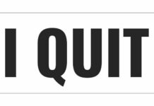 Drink Toss Costs State Department Job A bold text sign that reads 'I QUIT'