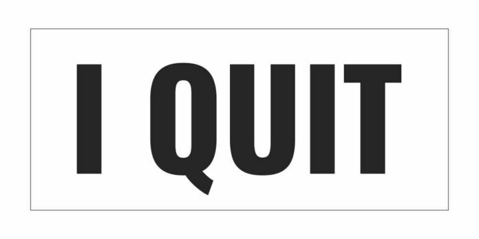 shutterstock_2398434243 A bold text sign that reads 'I QUIT'