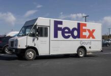 Pro Heist Drains FedEx FedEx delivery truck parked in a lot