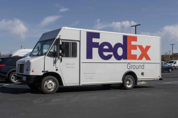 Zionsville,-,April,14,,2024:,Federal,Express,Delivery,Truck.,Fedex FedEx delivery truck parked in a lot
