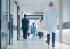 ALERT: Sick Kids Stranded Medical staff walking through a hospital corridor