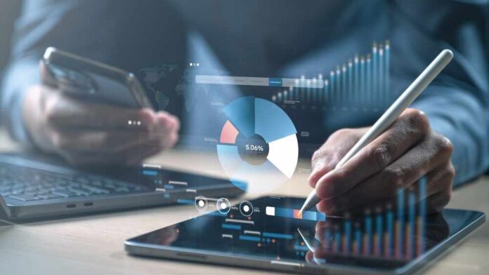 Sales,,Kpi,,Dashboard,,Metrics,,Targets,,Revenue,,A,Person,Analyzing,Sales Person using a laptop and smartphone with digital shopping icons