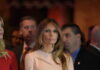 Melania Stuns Moscow, Kyiv Melania Trump at an event with a crowd in the background