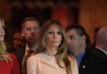 Melania Stuns Moscow, Kyiv Melania Trump at an event with a crowd in the background