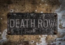 Chilling Death Row Hack Weathered metal sign reading 'DEATH ROW' on a wall